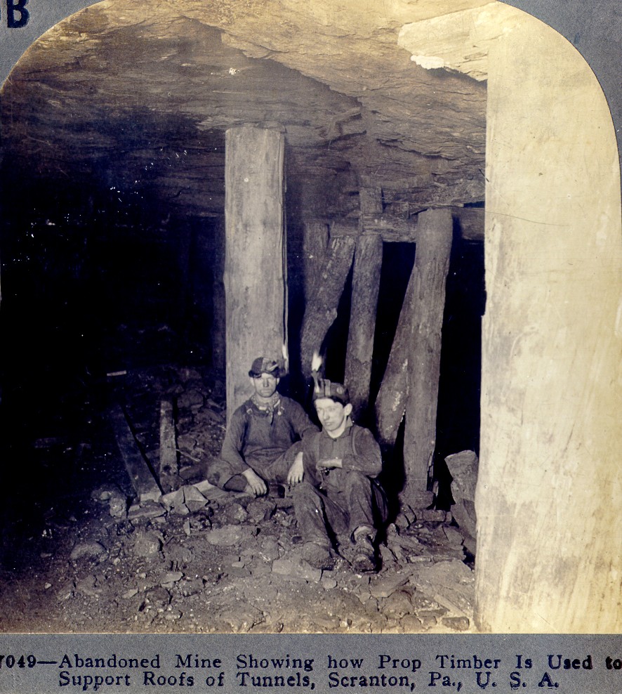 Abandoned mine with prop timber supporting roof